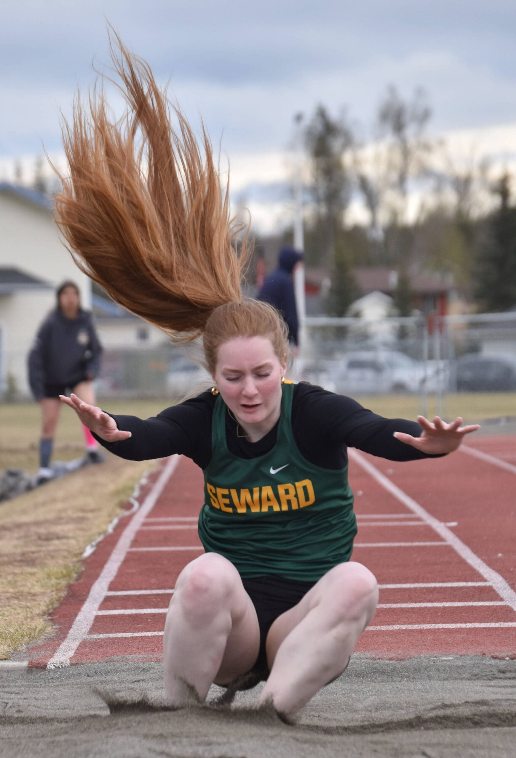 Seward’s Robin Cronin competes in the triple jump Saturday, May 11, 2024, at the Kenai Peninsula Borough meet at Soldotna High School in Soldotna, Alaska. (Photo by Jeff Helminiak/Peninsula Clarion)