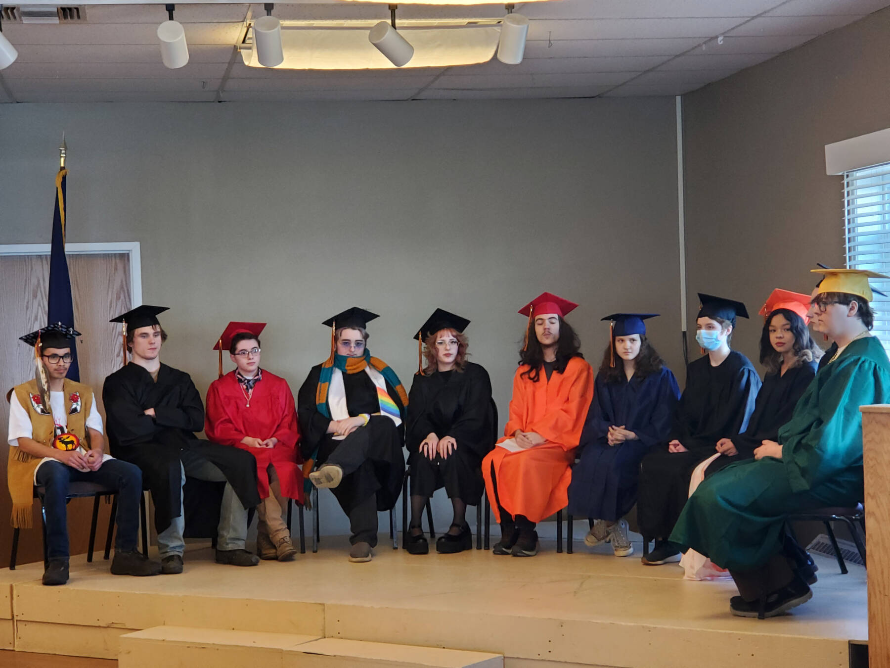 The Homer Flex High School graduating Class of 2024 is gathered for the commencement ceremony in the Quarter Deck at Land’s End Resort on Tuesday, May 14, 2024 in Homer, Alaska. (Delcenia Cosman/Homer News)