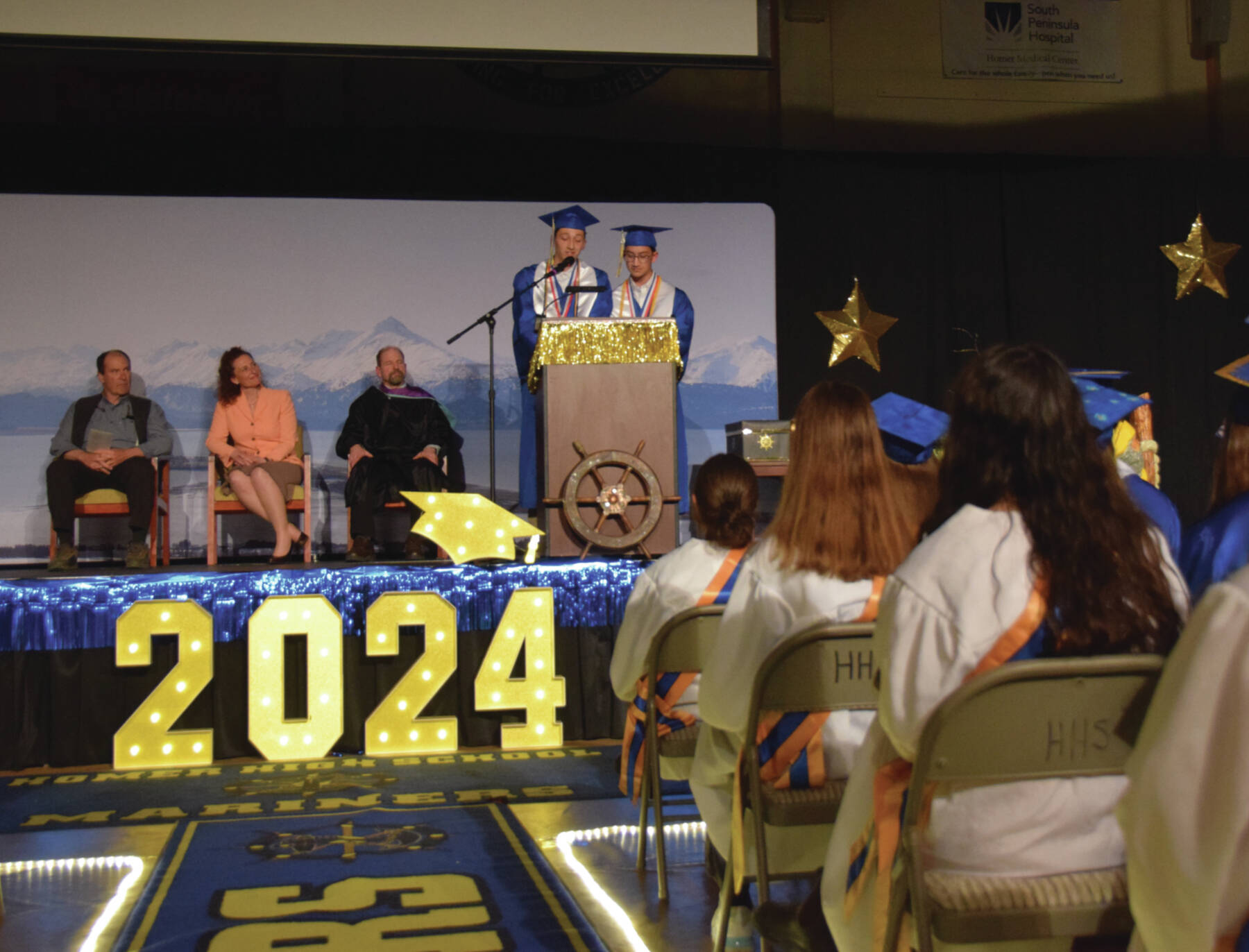 Valedictorian, Spencer Co, and salutatorian, Lucas Story, address the Homer High School graduates and crowd at the Tuesday evening commencement celebration at Homer High School, Tuesday, May 14, 2024, in Homer, Alaska. (Emilie Springer/Homer News)