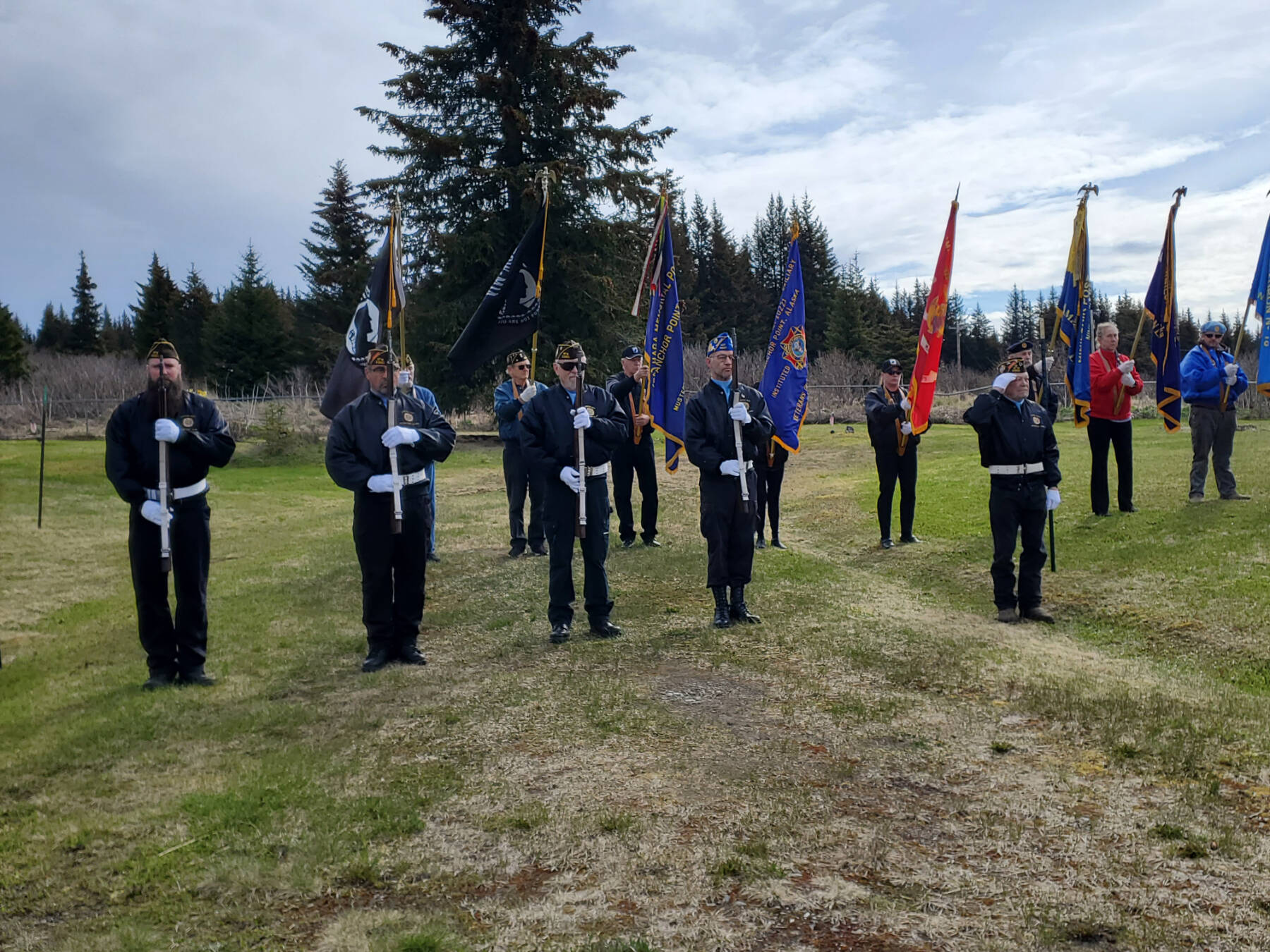 The Memorial Day service held at Hickerson Memorial Cemetery on Monday, May 27, 2024 in Homer, Alaska, includes an honor guard (front) and color guard (rear) comprised of members of the American Legion Posts 16 and 18 and the VFW Post 10221. (Delcenia Cosman/Homer News)