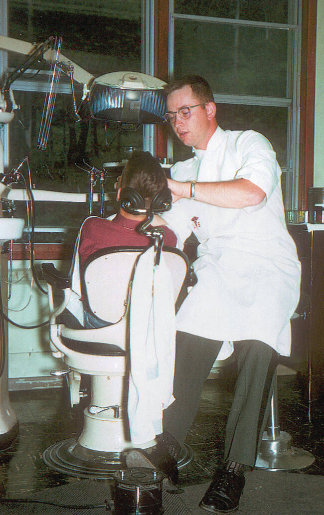 Photo courtesy of the Fair Family Collection
Near the beginning of his dentistry career, Dr. Calvin M. Fair, an officer in the U.S. Army, works on a patient at the Whittier Army Station in 1958.