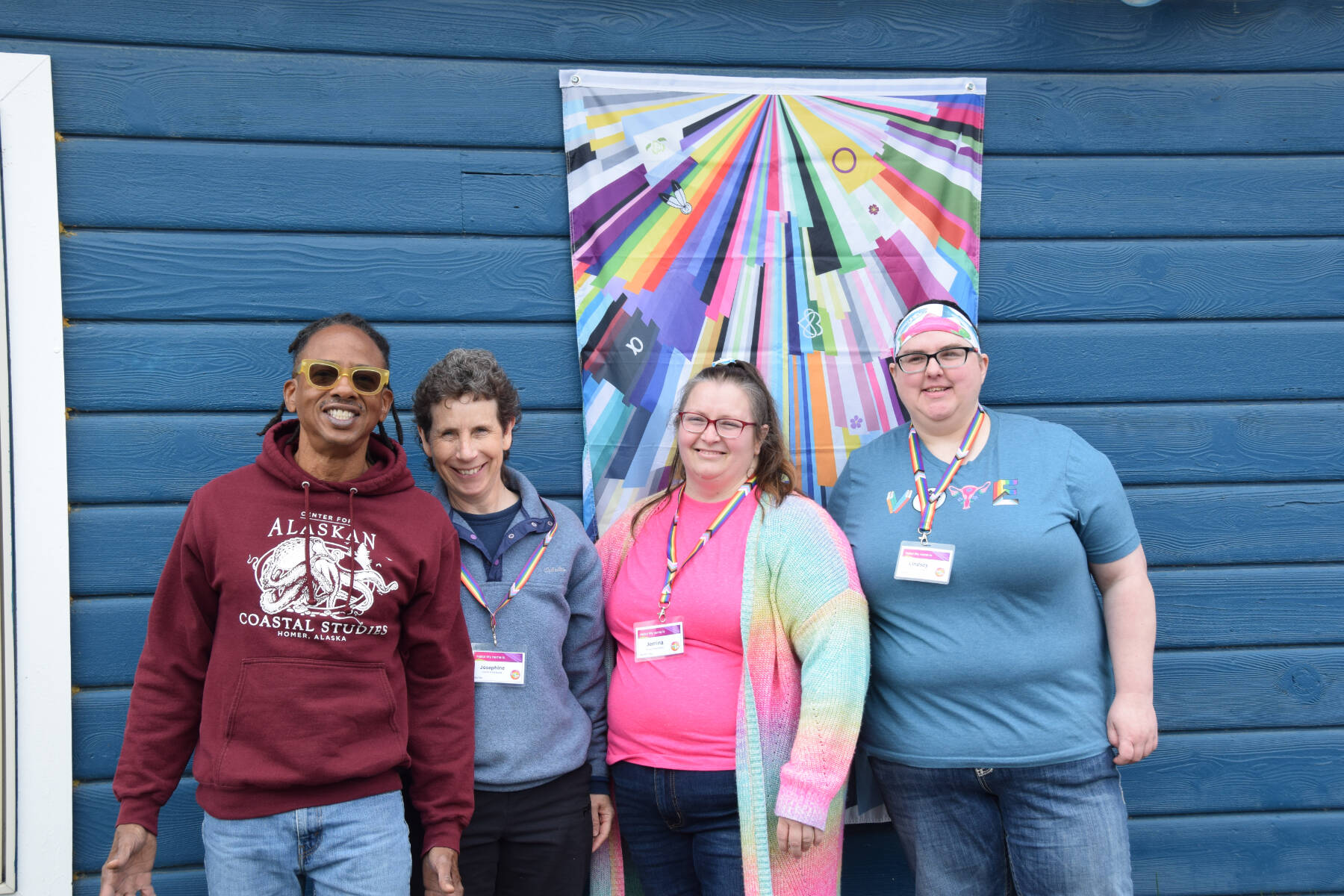 (from left to right) Ted Carter, Josephine Ryan, Jerrina Reed and Lindsey Wood with Homer Pride pose outside the Fireweed Mountain ZenDen Cafe during the Liberation Kickoff on Saturday, June 1, 2024 in Homer, Alaska. (Delcenia Cosman/Homer News)