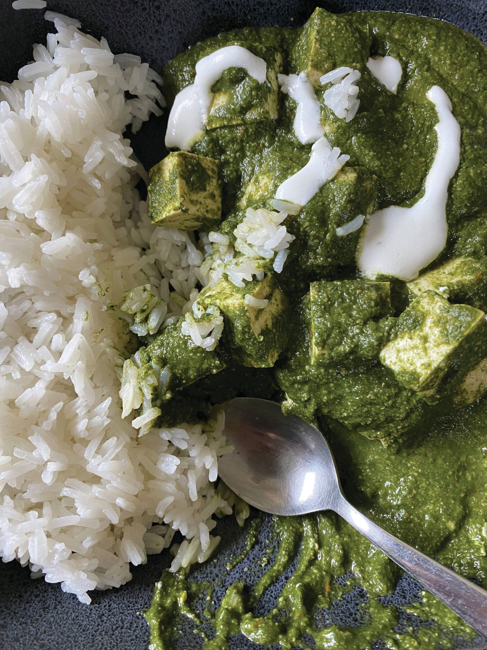 Palak tofu, served here with rice, is a vegan version of palak paneer. (Photo by Tressa Dale/Peninsula Clarion)