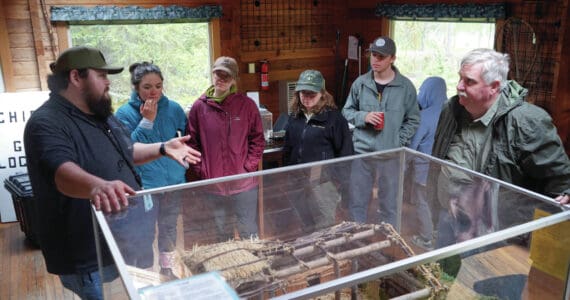 Jake Dye/Peninsula Clarion
Jonathan Wilson leads a tour at the K’beq’ Cultural Heritage Interpretive Site near Cooper Landing on Friday.