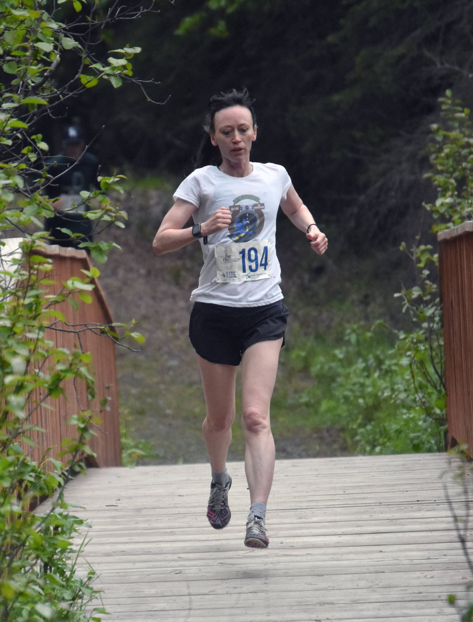 Morgan Ekemo runs to victory in the 5-kilometer race at the Run for the River on Saturday, June 8, 2024, in Soldotna, Alaska. (Photo by Jeff Helminiak/Peninsula Clarion)