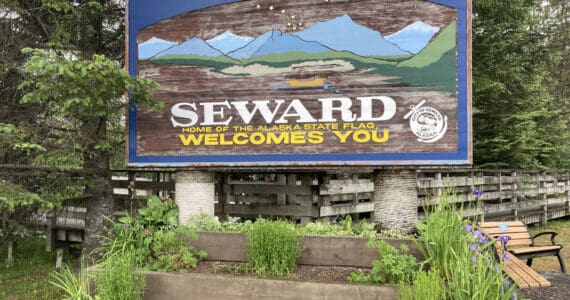 A sign welcomes visitors on July 7, 2021, in Seward, Alaska. (Photo by Jeff Helminiak/Peninsula Clarion)