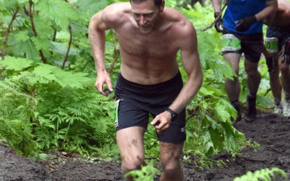 Anchorage’s Lars Arneson, a 2009 graduate of Cook Inlet Academy, competes in the men’s Mount Marathon Race on Tuesday, July 4, 2023, in Seward, Alaska. (Photo by Jeff Helminiak/Peninsula Clarion)