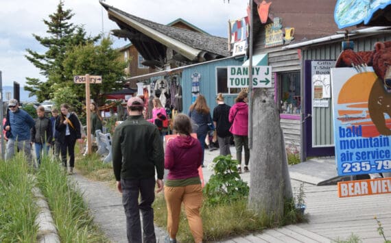 Visitors browse the shops along the Homer Spit on Friday, June 28, 2024, in Homer, Alaska. (Delcenia Cosman/Homer News)