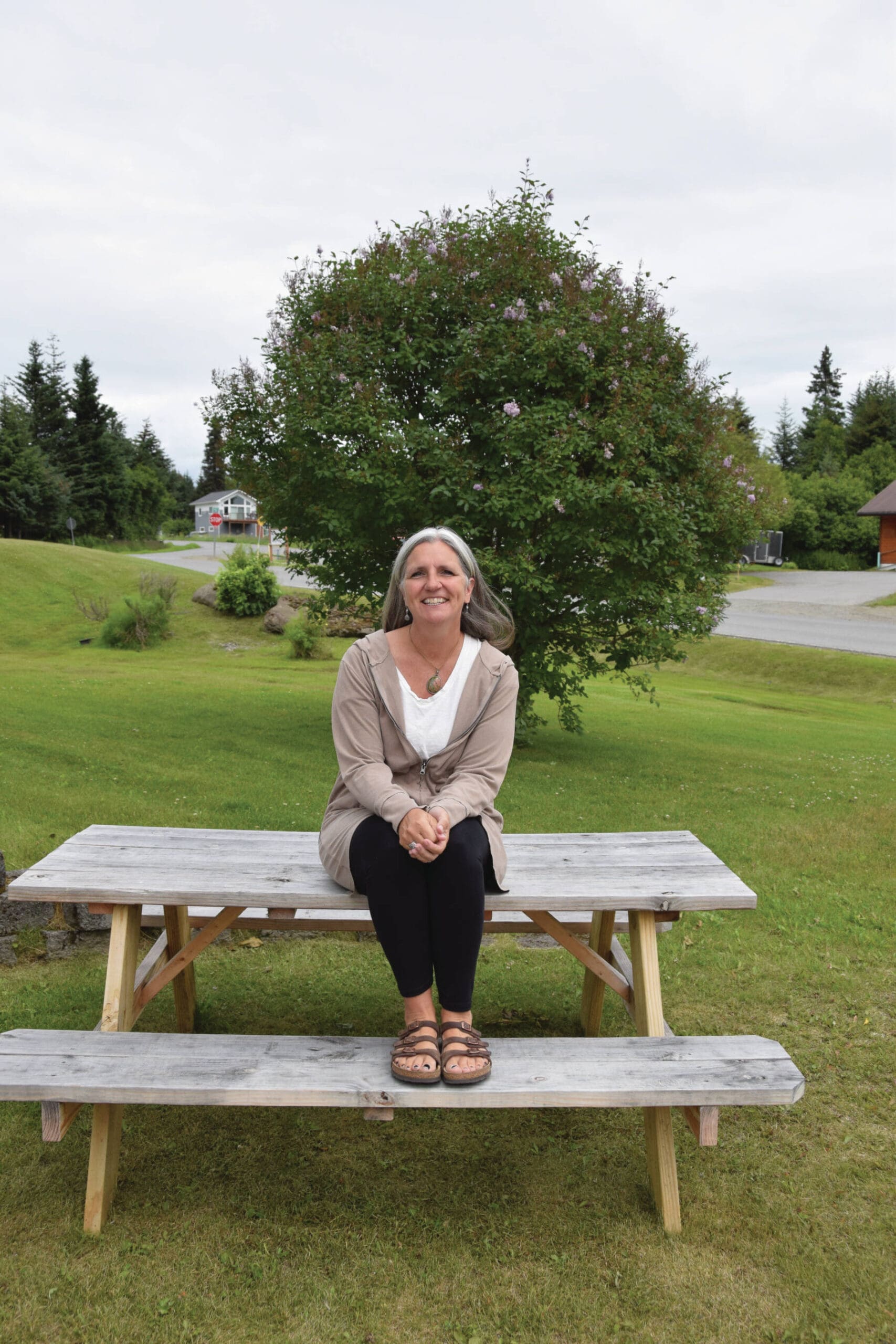 Stacey Schultz, new executive director for the Homer Foundation, sits outside of the foundation’s office after an interview with the Homer News. (Emilie Springer/Homer News)