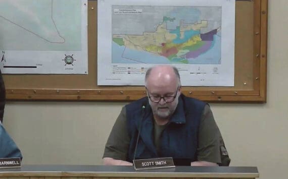 Homer Planning Commission chair Scott Smith reads his findings into the records regarding Doyon, Limited’s conditional use permit application at the special meeting on Wednesday, Jan. 31, 2024 in the Homer City Hall Cowles Council Chambers in Homer, Alaska. Screenshot.