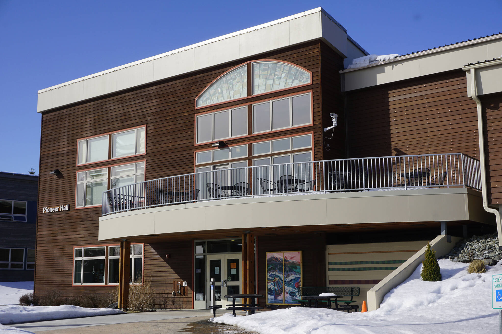 Snow melts on a sunny day at the Kachemak Bay Campus on March 16, 2020, in Homer, Alaska. (Photo by Michael Armstrong/Homer News)