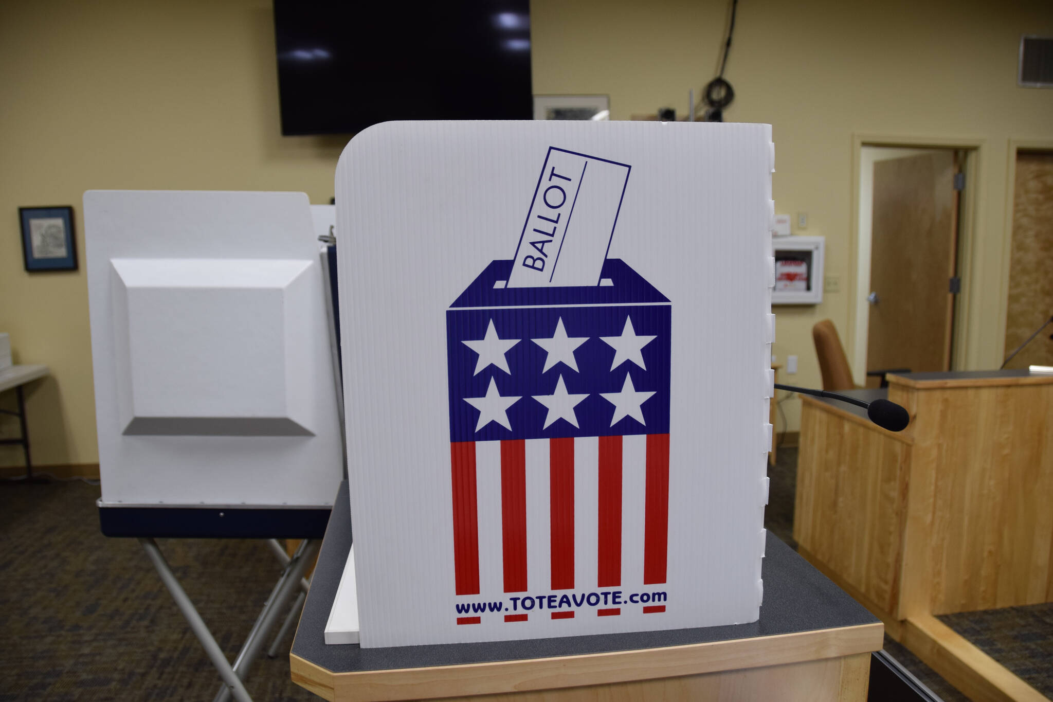 A voting booth for the Kenai Peninsula Borough and City of Homer elections at Cowles Council Chambers on Tuesday, Oct. 4, 2022 in Homer, Alaska. (Photo by Charlie Menke/ Homer News)