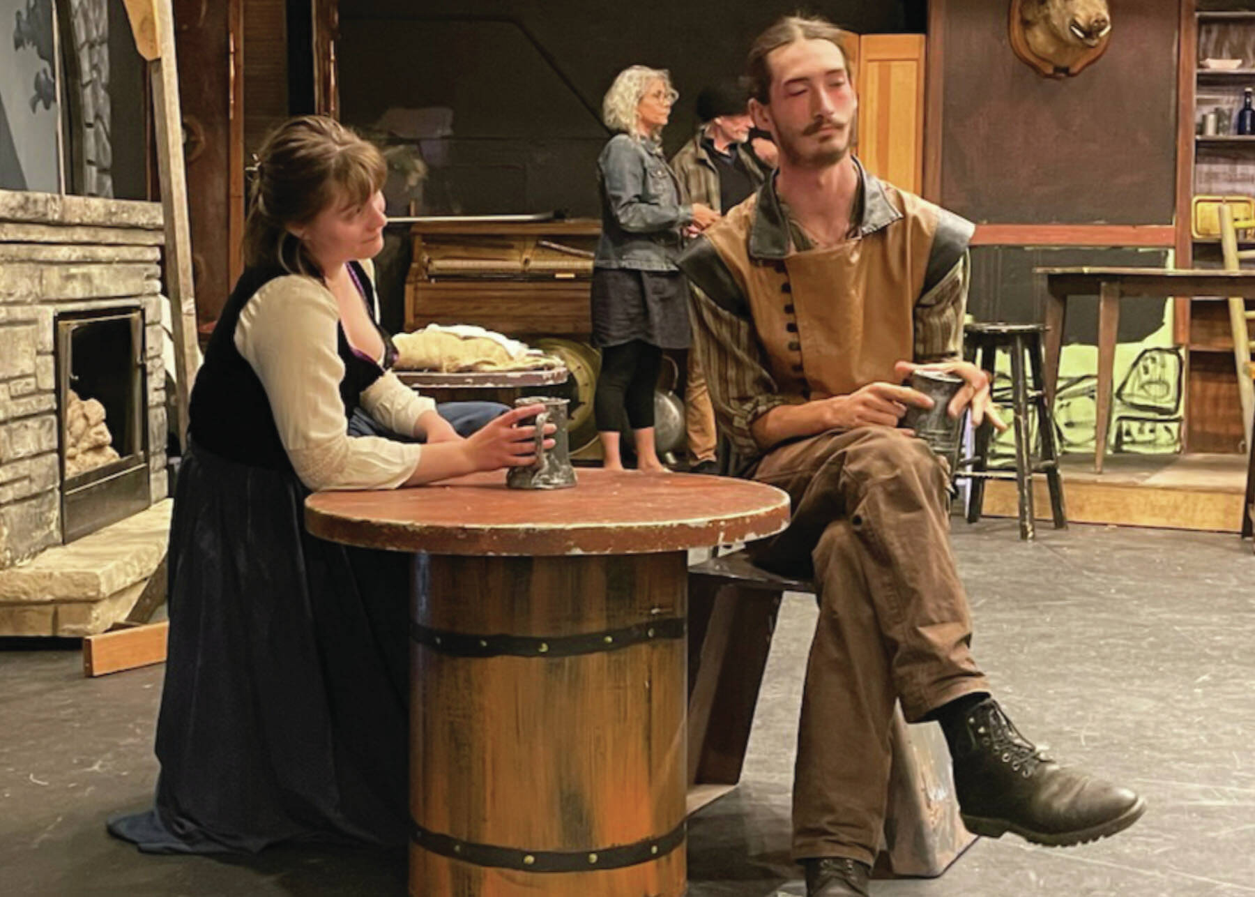 Katia Holmes and and Liam James rehearse script for “Falstaff and the Endless Machine” at the Pier One Theatre on Aug. 1, 2024 in Homer, Alaska. (Emilie Springer/ Homer News)