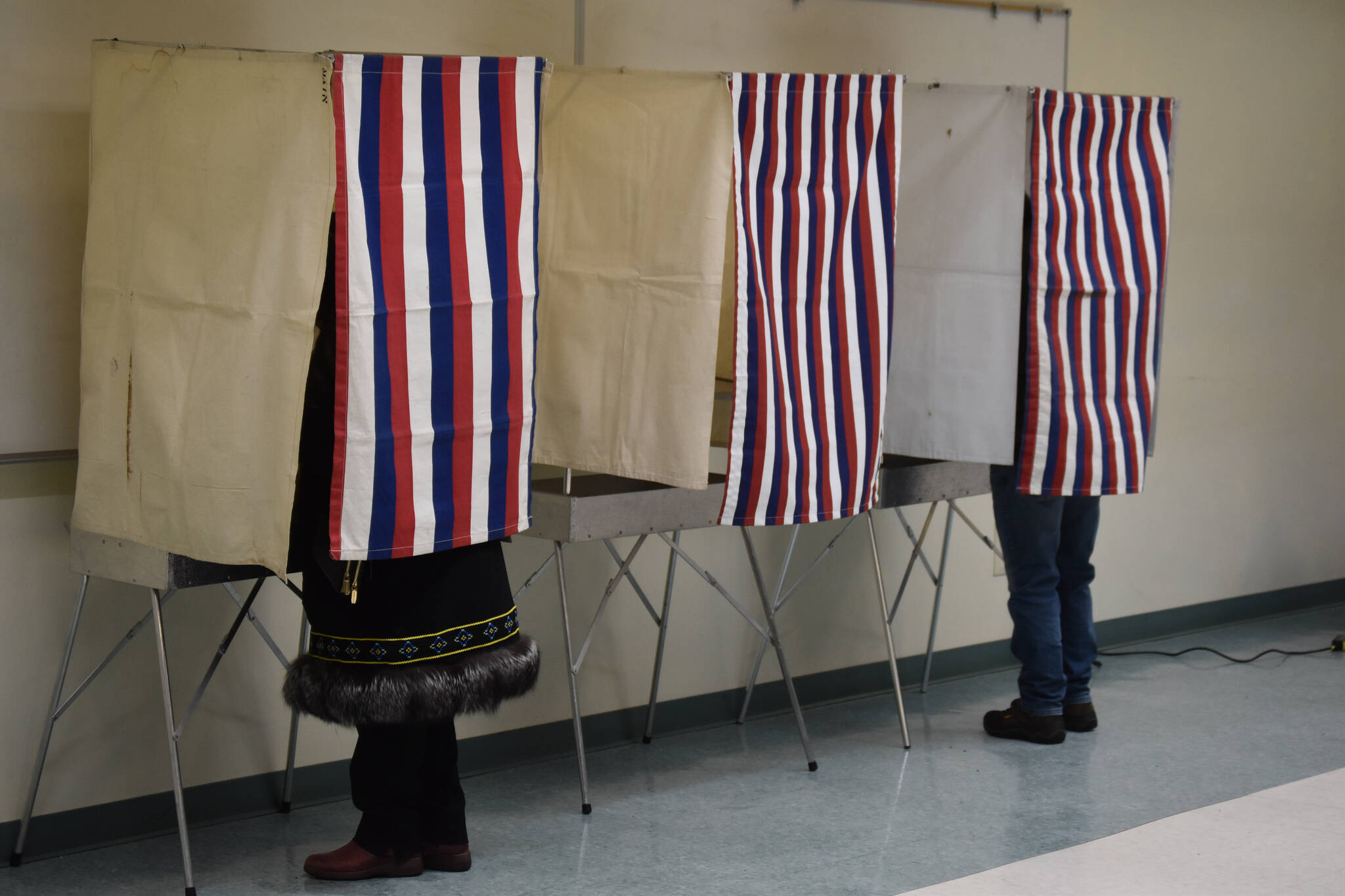 Voters fill out their ballots at the Challenger Learning Center in Kenai, Alaska on Election Day, Nov. 8, 2022. (Jake Dye/Peninsula Clarion)