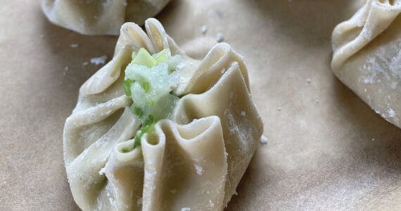 Gyoza wrappers are filled with shrimp and onion paste. (Photo by Tressa Dale/Peninsula Clarion)