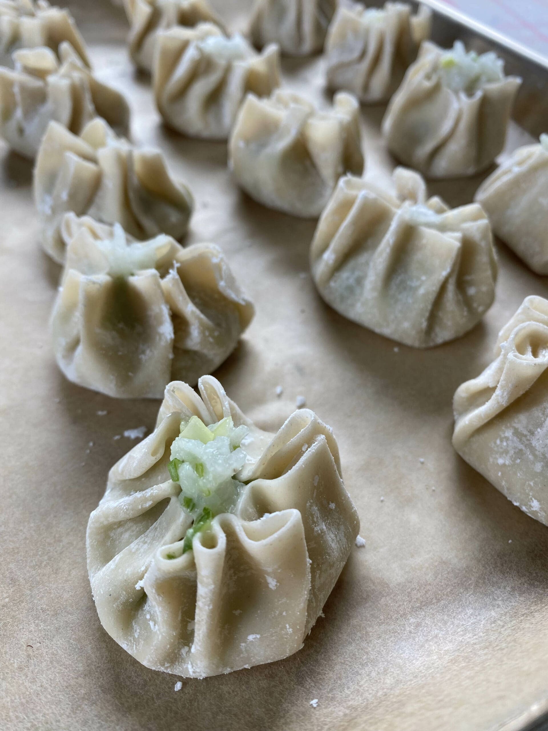 Gyoza wrappers are filled with shrimp and onion paste. (Photo by Tressa Dale/Peninsula Clarion)