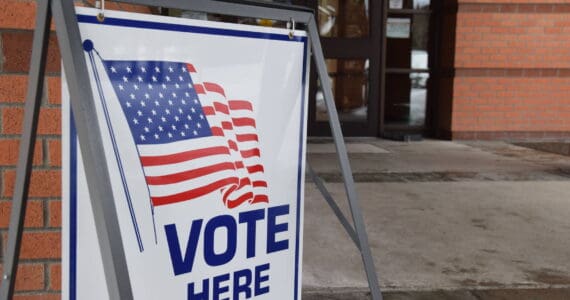 A sign directs voters at Soldotna City Hall during the special Field House election on March 5, 2019. (Photo by Brian Mazurek/Peninsula Clarion)