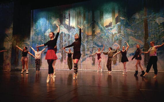 Left to right: Nutcracker ballet performers Aria Palma, Jaelynn Kennon, Tiya Martushev, Talli Dalke, Ireland Styvar, Sofia Loboy and Ella Gustafson rehearse the “Snow” dance onstage at the Homer High School Mariner Theatre on Sunday, Nov. 19, 2023, in Homer, Alaska. (Photo by Chris Kincaid/courtesy)