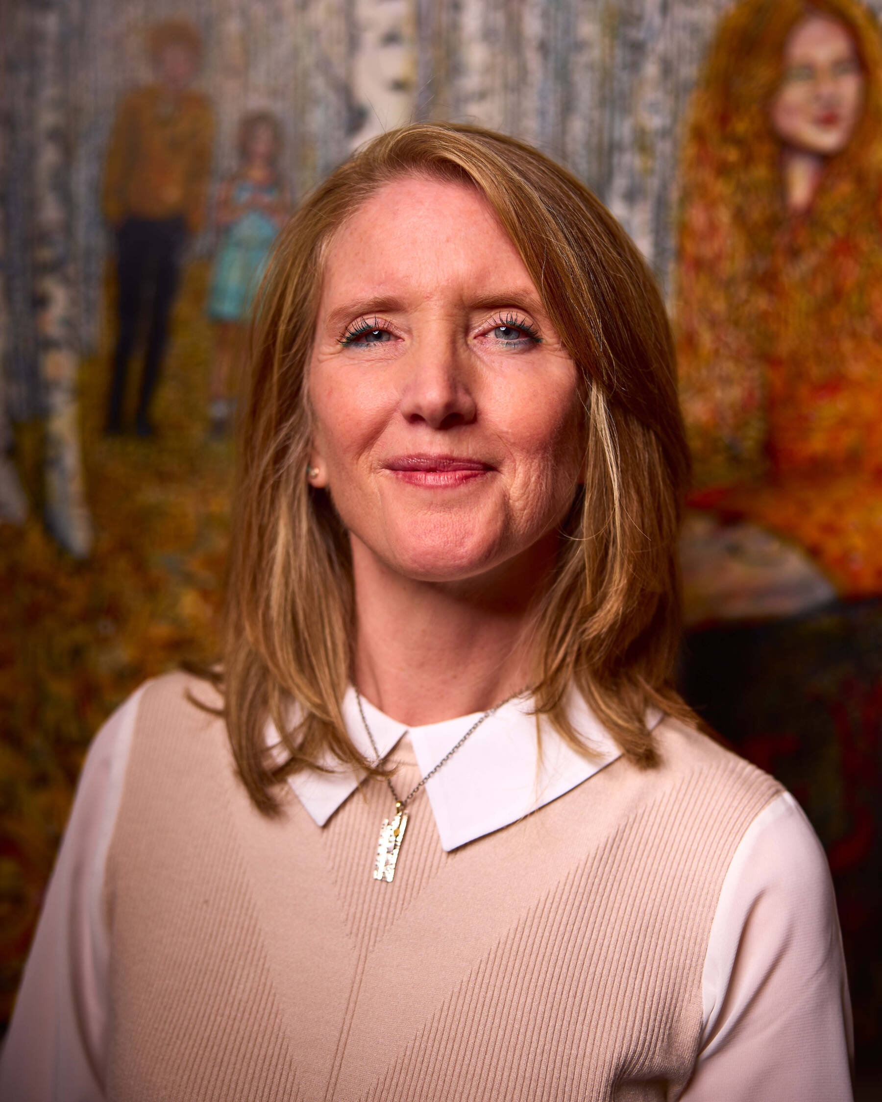 Marjorie Scholl poses at the opening of her Inner Stellar exhibit in May 2024 at the Pratt Museum in Homer, Alaska. Inner Stellar is on display through September. Photo by Chris Kincaid