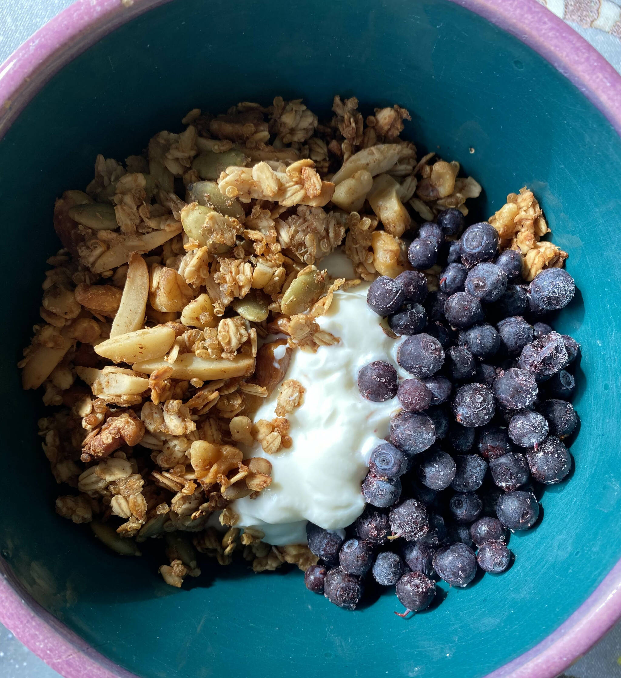 This apple cinnamon quinoa granola is only mildly sweet, perfect as a topping for honeyed yogurt or for eating plain with milk. (Photo by Tressa Dale/Peninsula Clarion)