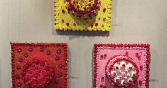 “Party Time,” “Love and Roses,” and “Cherry Delight” cakes, created with acrylic, plastic foam and beads on cradled board, are part of Sami Ali’s collection “The Death of Retail” on display at Homer Council on the Arts through September 2024. (Emilie Springer/ Homer News)