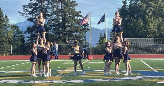 Homer Mariner cheerleaders perform at half time during the game against Kodiak on Friday, Sept. 13, in Homer, Alaska. Varsity defeated Kodiak 58 to 6. (Emilie Springer/ Homer News)