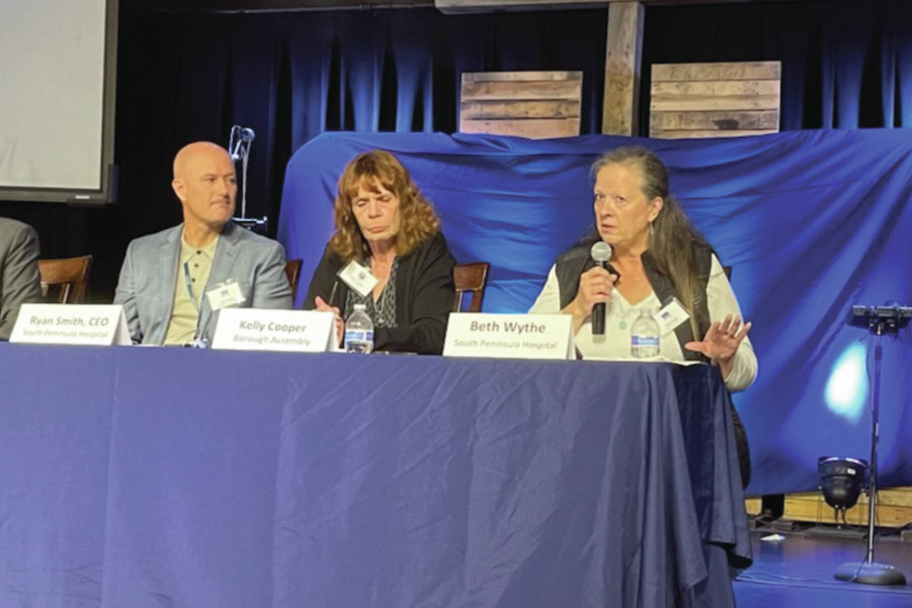 From left: South Peninsula Hospital CEO Ryan Smith; Kenai Peninsula Borough Assembly member Kelly Cooper; and South Peninsula Hospital Board of Directors member Beth Wythe address community questions regarding Proposition 1 authorizing a $38.5 million bond at a meeting last Friday, Sept. 13, 2024. (Emilie Springer/ Homer News)