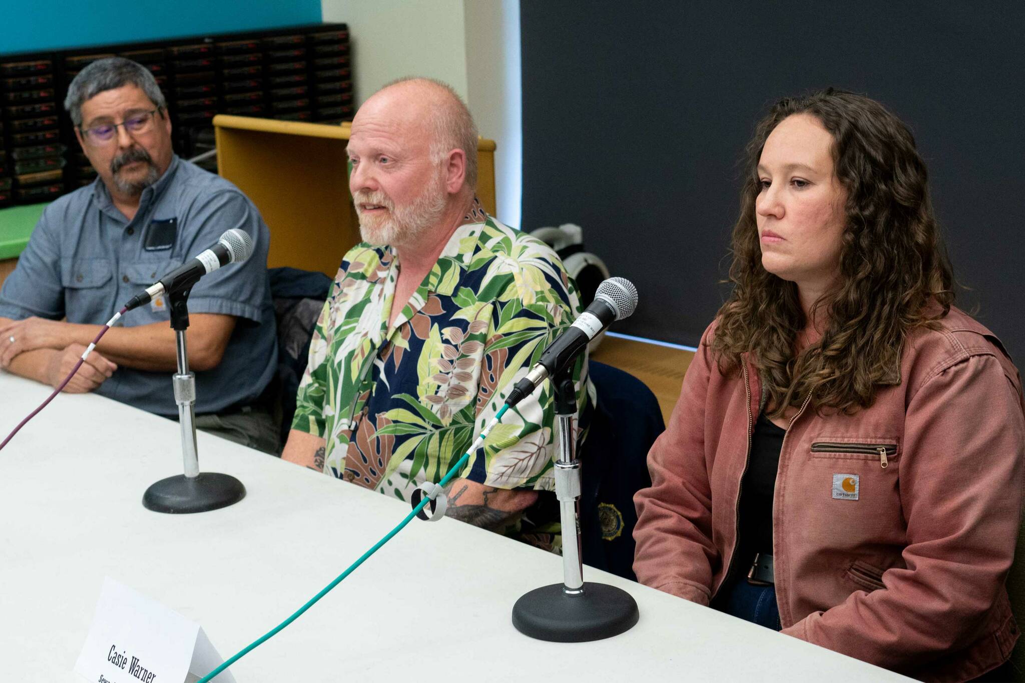 John Osenga, Michael Calhoon and Casie Warner participate in a Seward City Council candidate forum hosted by KBBI 890 AM and the Peninsula Clarion at the Seward Community Library and Museum in Seward, Alaska, on Thursday, Sept. 12, 2024. (Jake Dye/Peninsula Clarion)