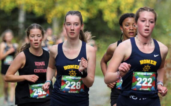 Homer’s Claira Booz, right, and Beatrix McDonough, left, lead a small pack of runners during the Wasilla Trailblazer Invite on Friday, Sept. 13, 2024, in Wasilla, Alaska. (Photo by Jeremiah Bartz/Frontiersman)