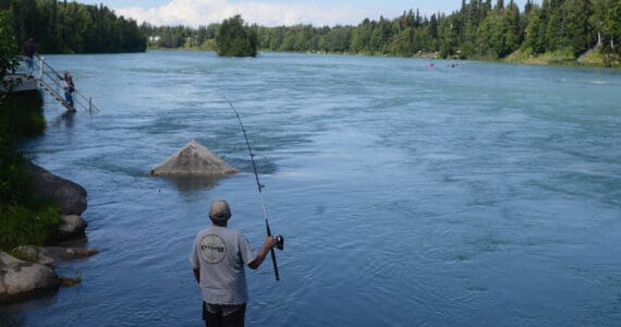 A man fishes in the Kenai River on July 16, 2018, in Soldotna, Alaska. (Peninsula Clarion/file)