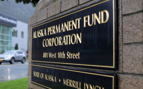 Cars drive past the building where the Alaska Permanent Fund Corp. is headquartered on Sept. 21, 2023. (Clarise Larson/Juneau Empire file photo)