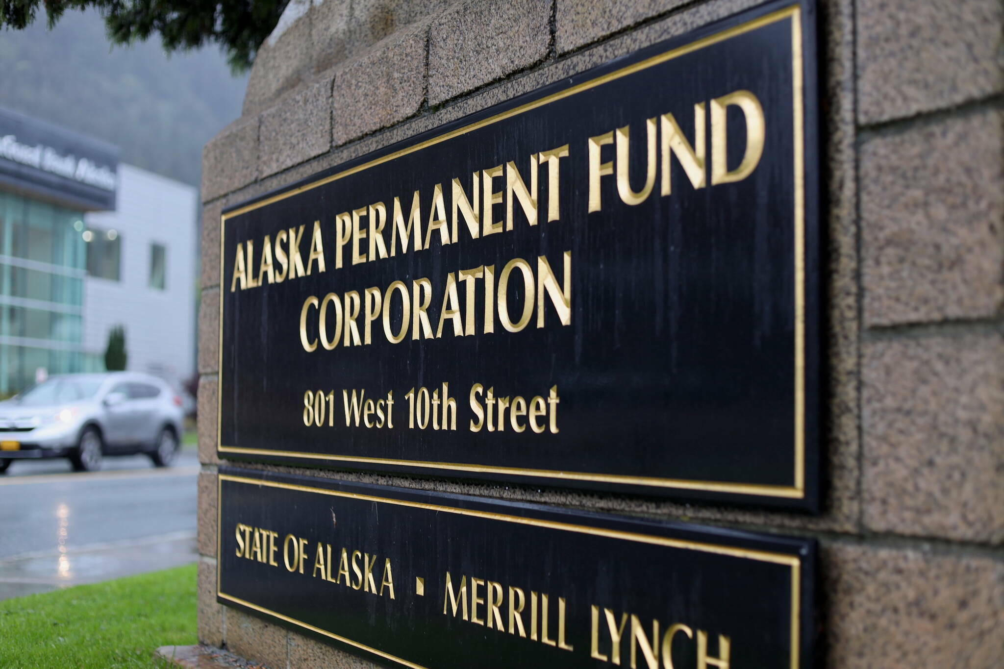 Cars drive past the building where the Alaska Permanent Fund Corp. is headquartered on Sept. 21, 2023. (Clarise Larson/Juneau Empire file photo)