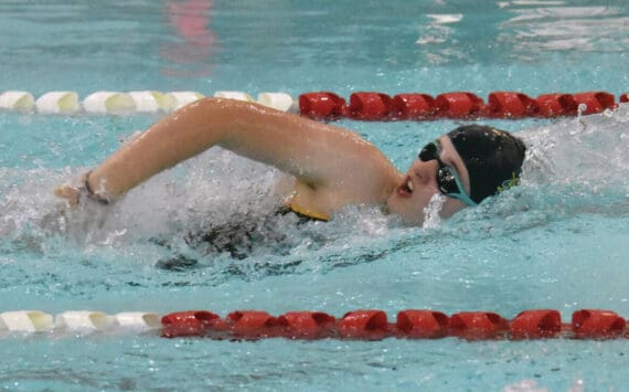 Homer’s Avery Briscoe competes in the 400-yard freestyle relay at the Kenai Invitational on Saturday, Sept. 21 at Kenai Central High School in Kenai. (Photo by Jeff Helminiak/Peninsula Clarion)