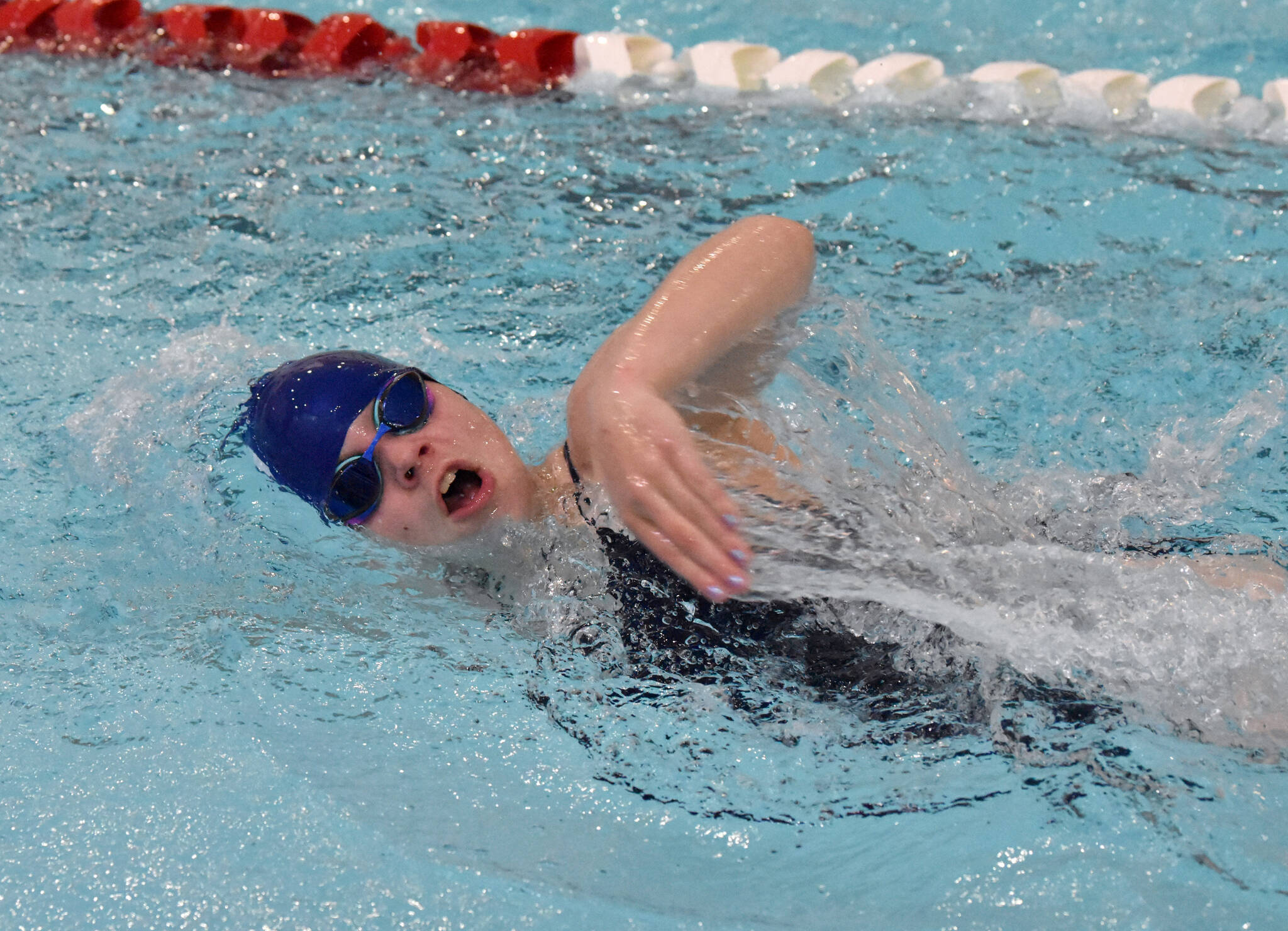 Soldotna’s Gen Sheldon competes in the 400-yard freestyle relay at the Kenai Invitational on Saturday, Sept. 21, 2024, at Kenai Central High School in Kenai, Alaska. (Photo by Jeff Helminiak/Peninsula Clarion)