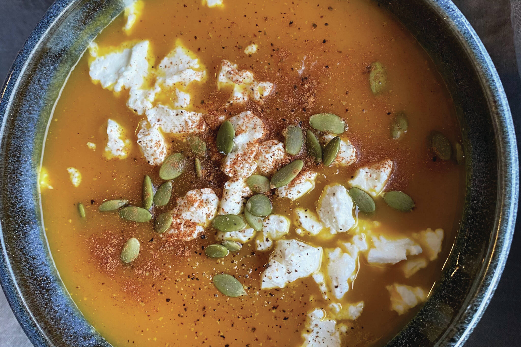 This roasted pumpkin, apple and carrot soup is smooth and sweet. (Photo by Tressa Dale/Peninsula Clarion)