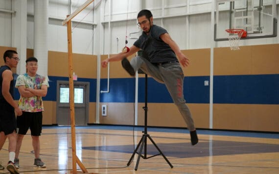 Alaska Christian College students perform a demonstration of Native Youth Olympics during a dedication ceremony for the college’s new athletic center at Alaska Christian College in Soldotna, Alaska, on Friday, Sept. 27, 2024. (Jake Dye/Peninsula Clarion)