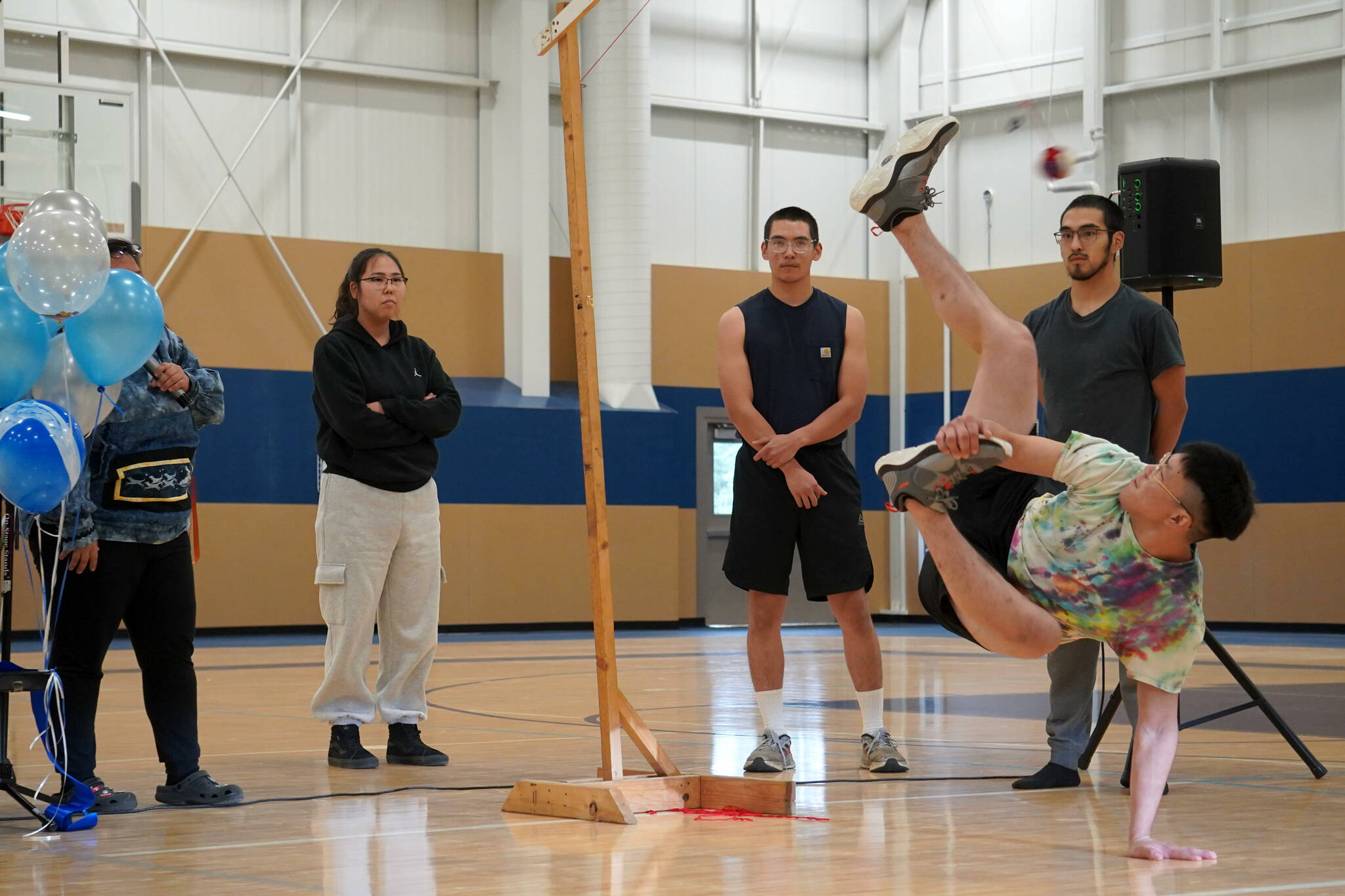 Alaska Christian College students perform a demonstration of Native Youth Olympics during a dedication ceremony for the college’s new athletic center at Alaska Christian College in Soldotna, Alaska, on Friday, Sept. 27, 2024. (Jake Dye/Peninsula Clarion)