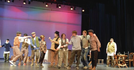 Emilie Springer/Homer News
Homer performers sing and dance in “To Life” from the musical “Fiddler on the Roof” at a dress rehearsal on Oct. 3<ins>, 2024</ins> on the Mariner Stage in Homer<ins>,</ins> <ins>Alaska</ins>.