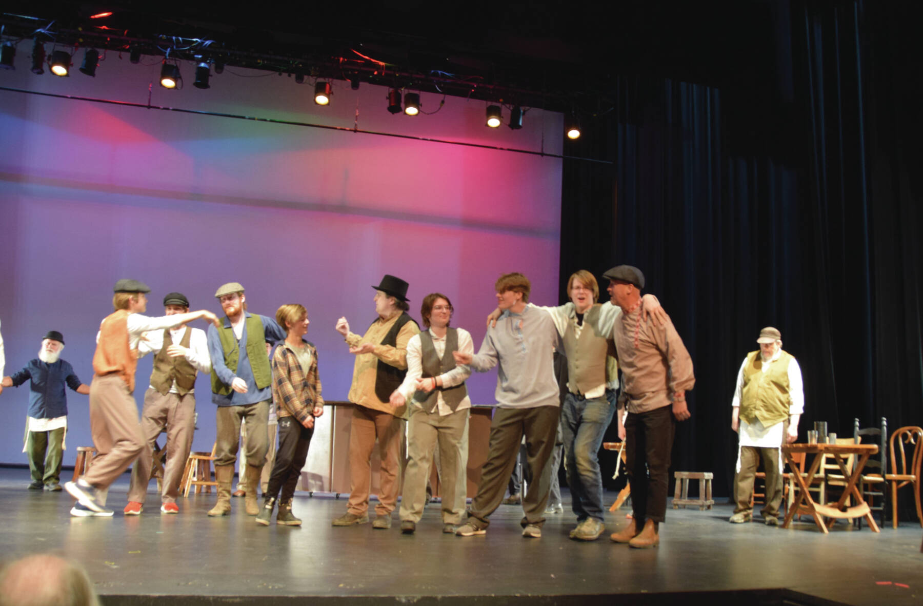 Emilie Springer/Homer News
Homer performers sing and dance in “To Life” from the musical “Fiddler on the Roof” at a dress rehearsal on Oct. 3<ins>, 2024</ins> on the Mariner Stage in Homer<ins>,</ins> <ins>Alaska</ins>.