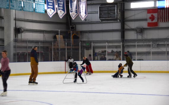 Young and experienced skaters alike enjoy the ice at the Kevin Bell Arena during opening day on Saturday, Oct. 5, 2024, in Homer, Alaska. In addition to a free open skate, the arena also hosted a hockey gear swap and stick time, and a free barbecue lunch for attending community members. Attendees were also encouraged to register for a variety of upcoming skating programs, including youth and adult hockey, figure skating and learn-to-skate classes. (Delcenia Cosman/Homer News)