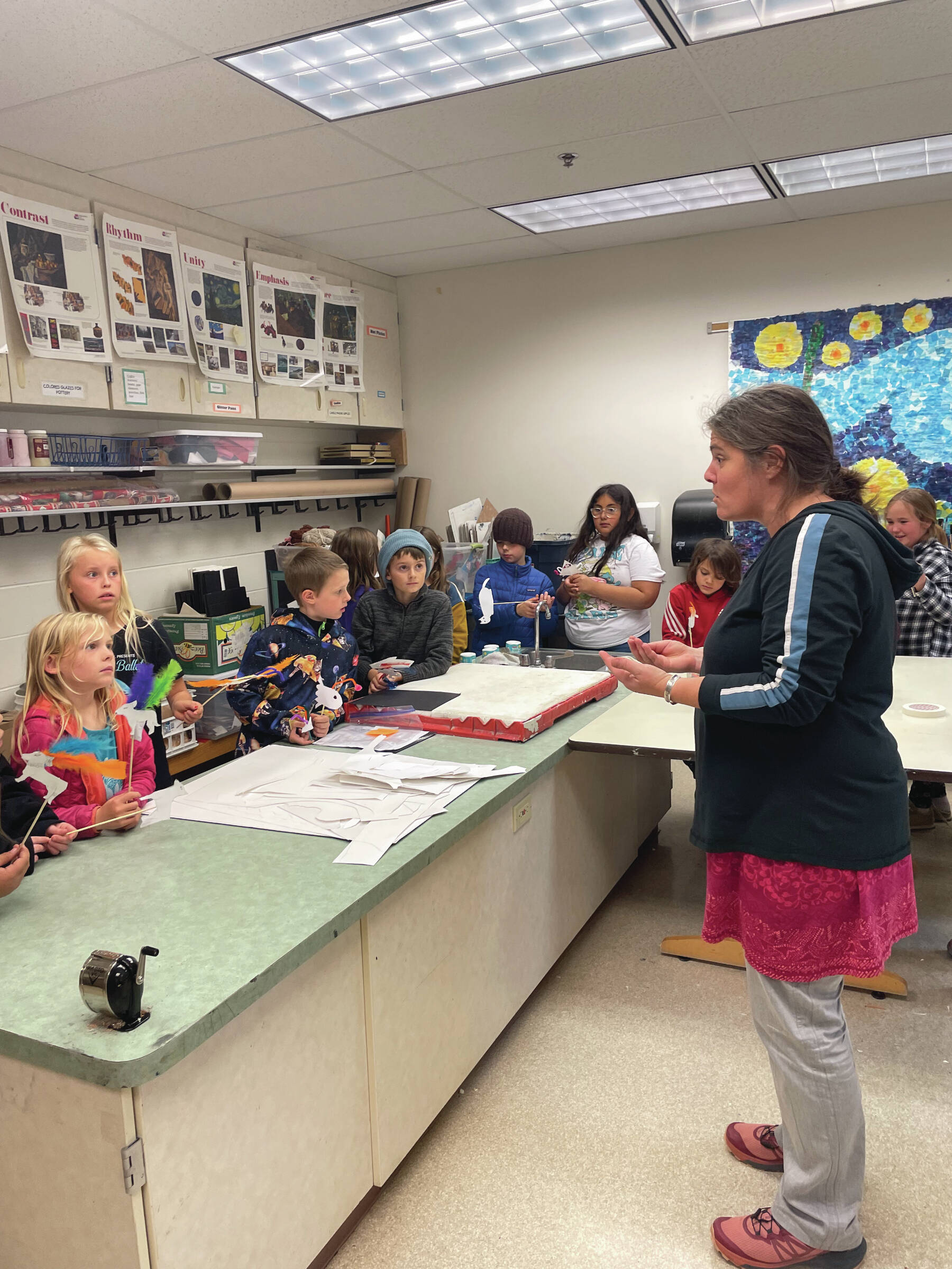 Emilie Springer/Homer News
Maite Agopian addresses third- and fourth-grade Fireweed Academy students with their newly created shadow puppets in the West Homer Elementary art room on Monday, Oct. 7<ins>,</ins><ins> 2024 in Homer, </ins><ins>Alaska</ins>.