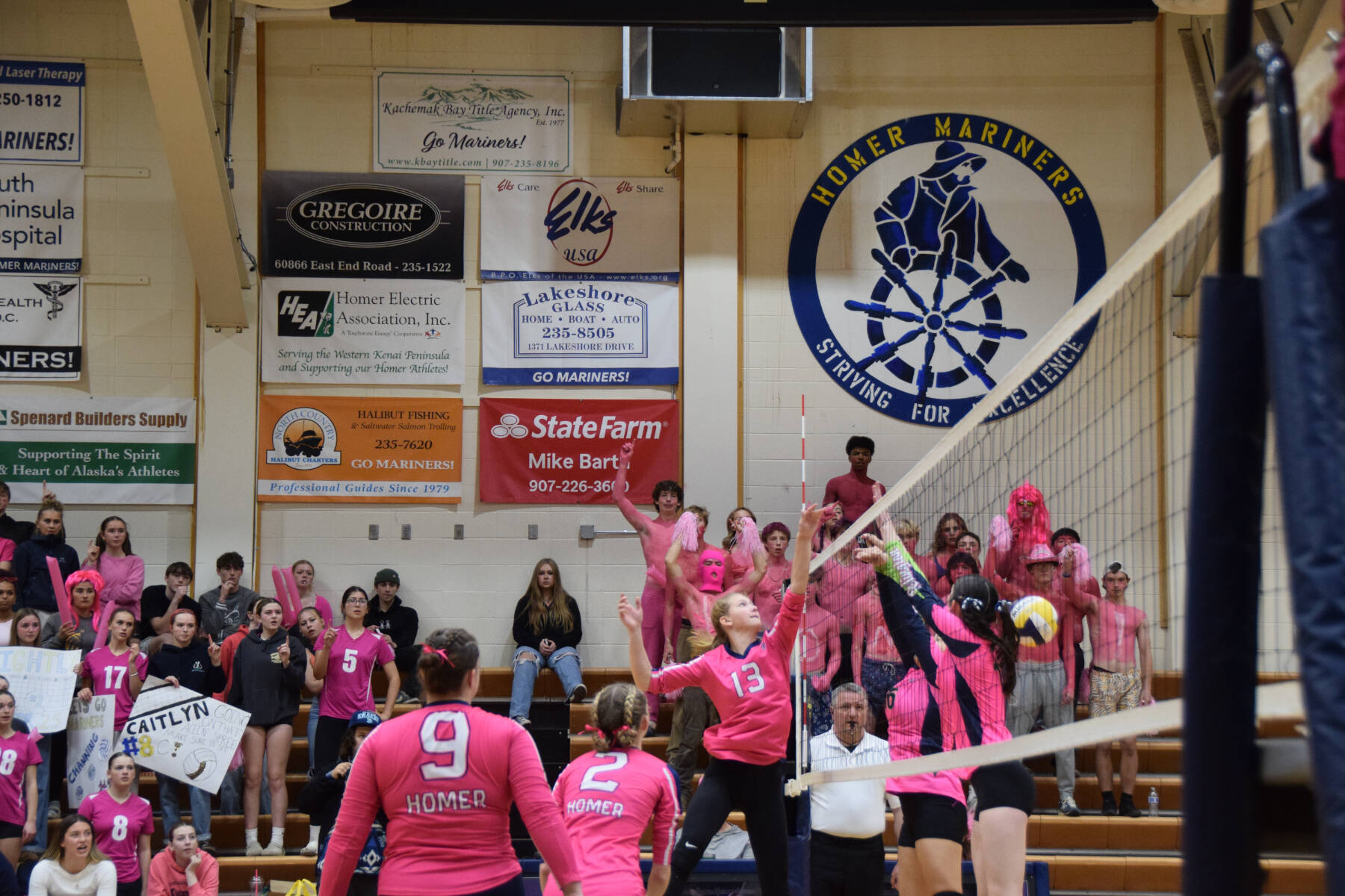 Grace Miotke spikes the ball over the net during the varsity game against Redington on Saturday, Oct. 5, 2024, in the Alice Witte Gymnasium at Homer High School in Homer, Alaska. (Delcenia Cosman/Homer News)