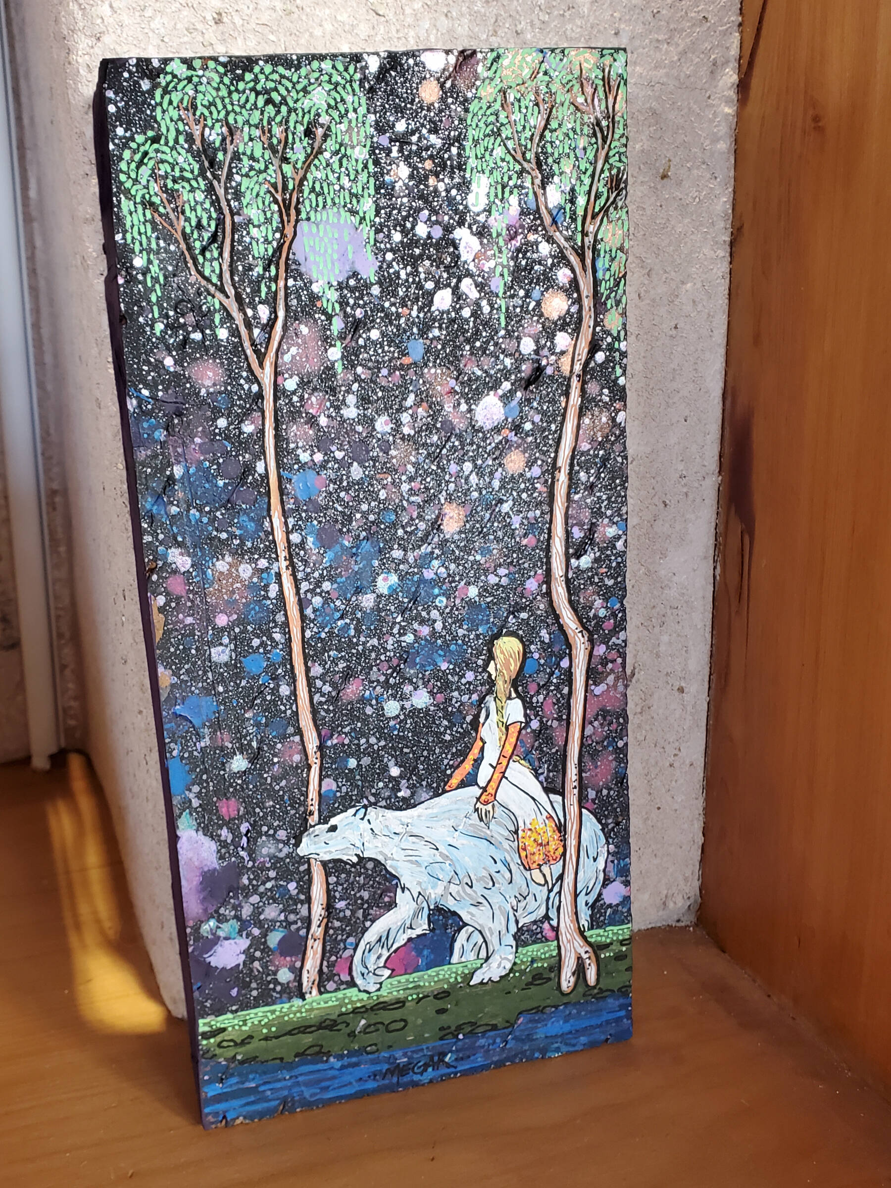 Artwork by Megan Frost is on display in the Homer Public Library’s fireplace lounge on Monday, Oct. 14, 2024, in Homer, Alaska. (Delcenia Cosman/Homer News)