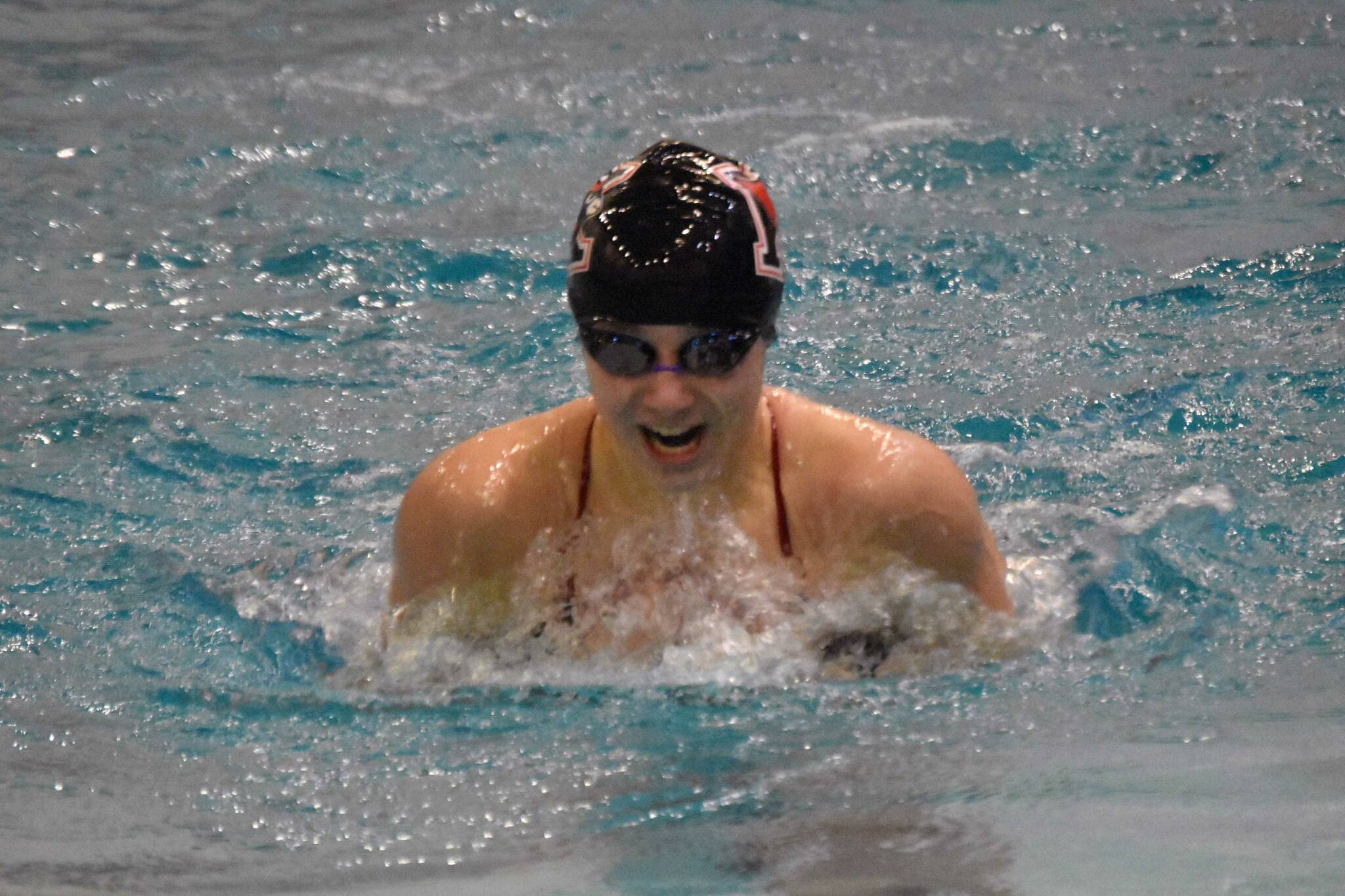 Kenai Central's Sierra Hershberger competes in the 100-yard individual medley in the SoHi Pentathlon on Friday, Oct. 11, 2024, at Soldotna High School in Soldotna, Alaska. (Photo by Jeff Helminiak/Peninsula Clarion)