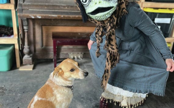 A model presents a frog mask created by Carly Garay for the 2023 Homer Wearable Arts show ‘Camp.’ Photo by Annie Garay.