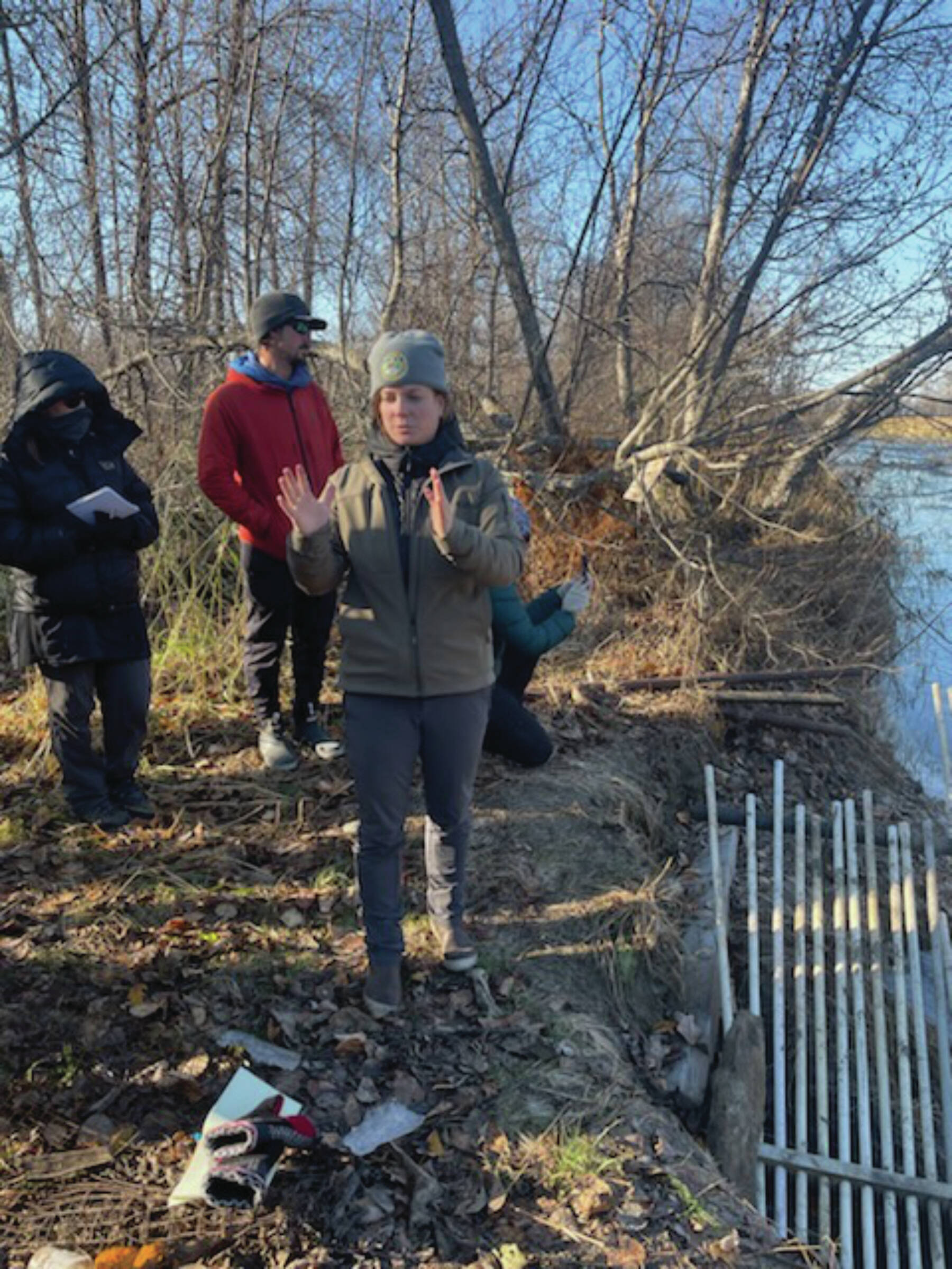 ADFG assistant area sport fish manager with ADFG explains some of the features of the underwater camera used to measure and track fish at the Anchor River weir on Saturday Oct. 19, 2024 in Anchor Point, Alaska. Emilie Springer/ Homer News.