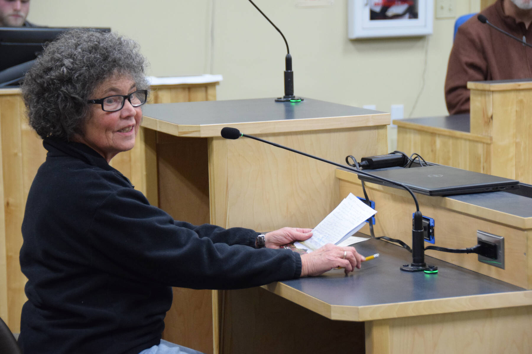 Homer resident Betty Seaman, who lives adjacent to the proposed Lighthouse Village redevelopment, gives public comment to the Planning Commission on Doyon, Limited’s revised application during a special meeting on Wednesday, Oct. 16, 2024, in the Homer City Hall Cowles Council Chambers in Homer, Alaska. (Delcenia Cosman/Homer News)