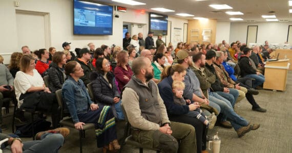 Parents and supporters of Aurora Borealis Charter School fill the Betty J. Glick Assembly Chambers during a meeting of the Kenai Peninsula Borough School District Charter Oversight Committee in Soldotna, Alaska, on Monday, Oct. 21, 2024. (Jake Dye/Peninsula Clarion)