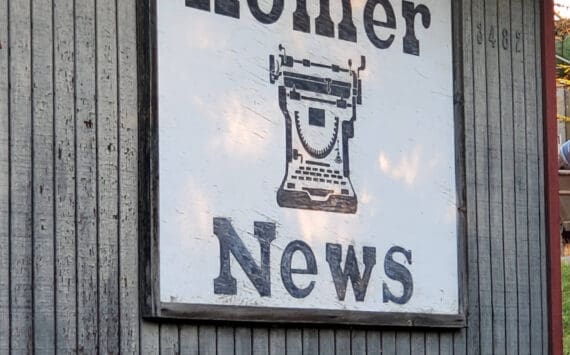 The Homer News sign hangs on the outside of the newspaper’s former office building on Landings Street on Thursday, Oct. 17, 2024, in Homer, Alaska. (Delcenia Cosman/Homer News)