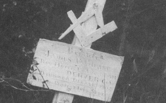 Photo courtesy of the Secora Collection
This 1939 Joe Secora photograph shows the wooden marker on the grave of James Chase, who drowned in Tustumena Lake in 1902.